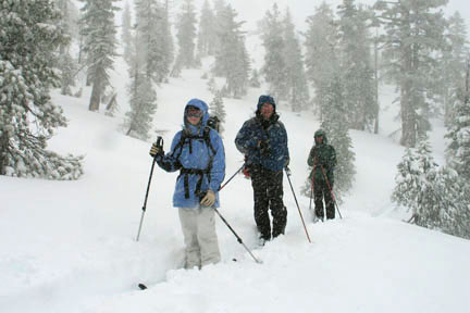 Image of skiers traversing toward Round Valley in storm