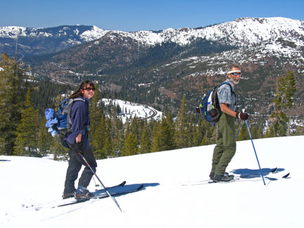 Image looking down at railroad tracks with Signal Peak on far right