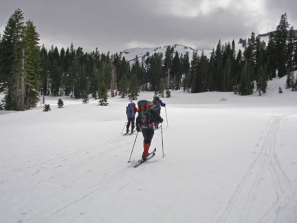 Image of skiers heading to final saddle