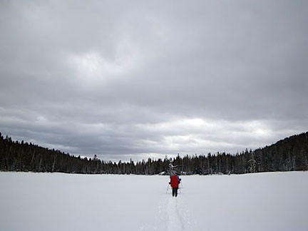 Image of skiing across Miller Lake