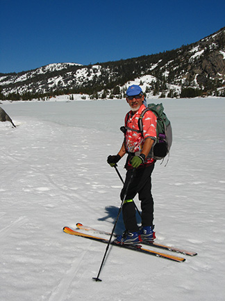 Image of skier on south shore of Lower Echo Lake